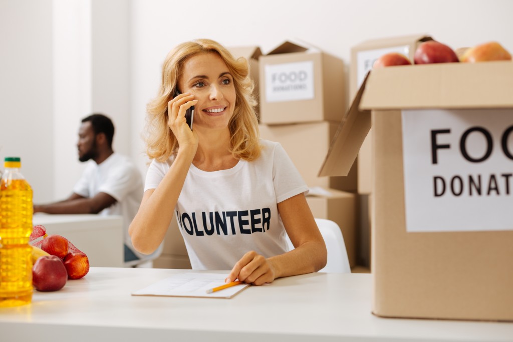 woman volunteer on the phone