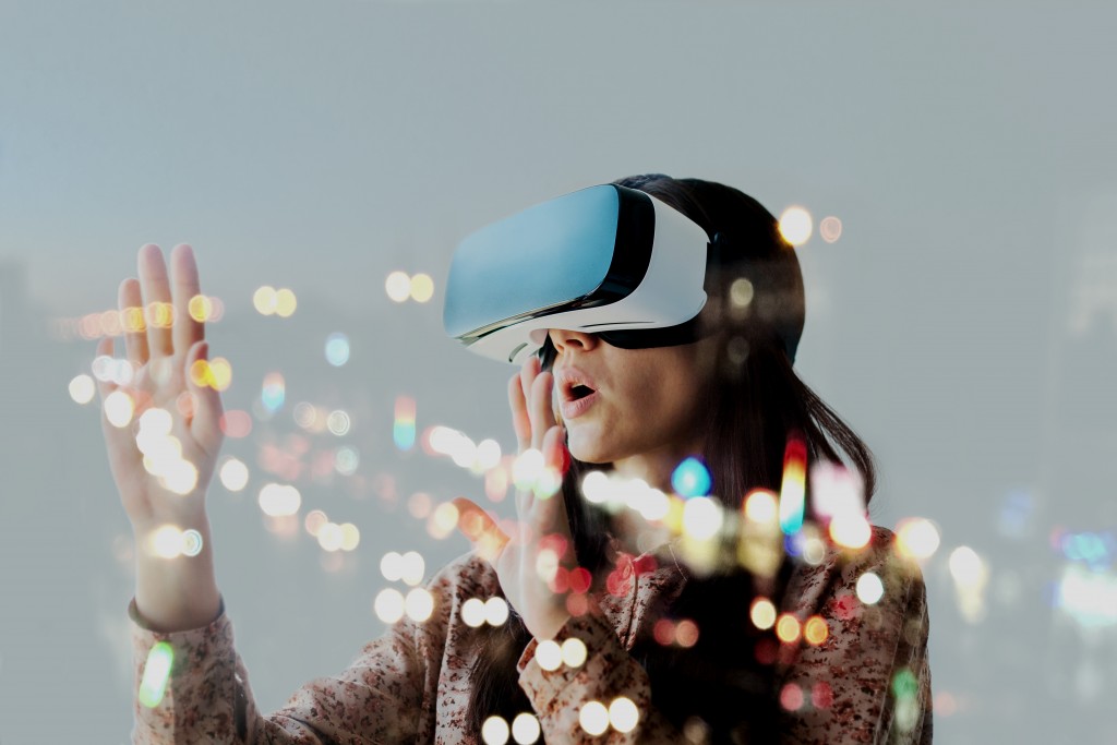 woman fascinated with VR Game