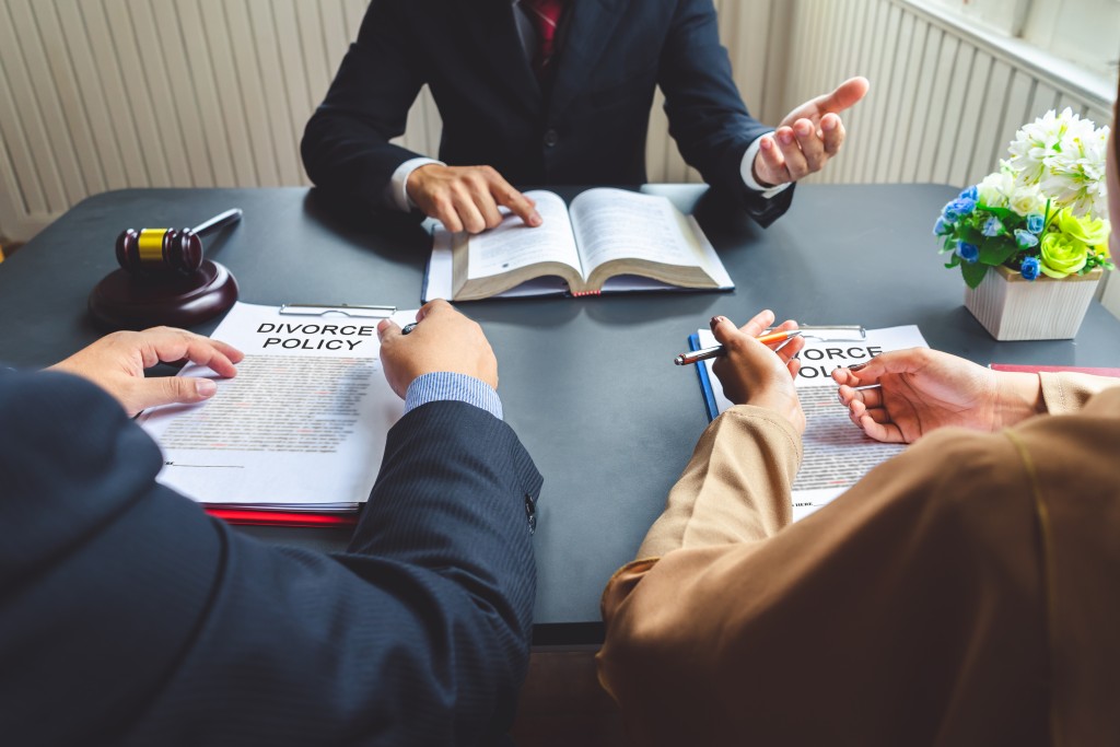 couple speaking to a divorce lawyer