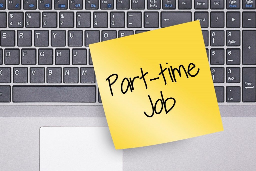 part-time job written in a yellow sticky note