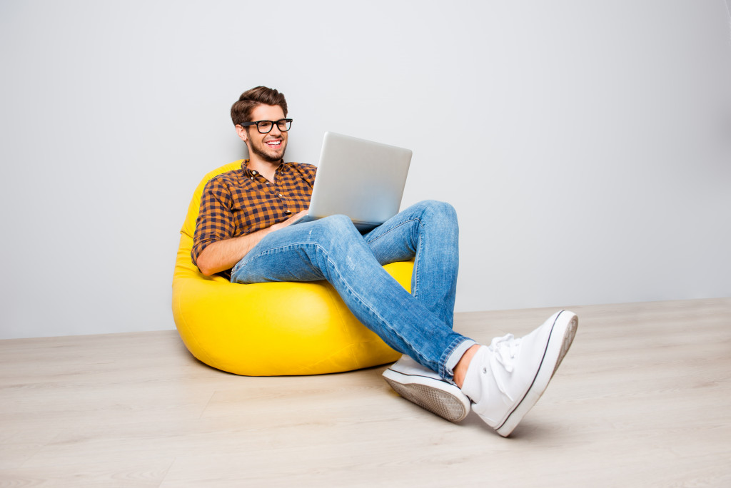man working on a beanbag