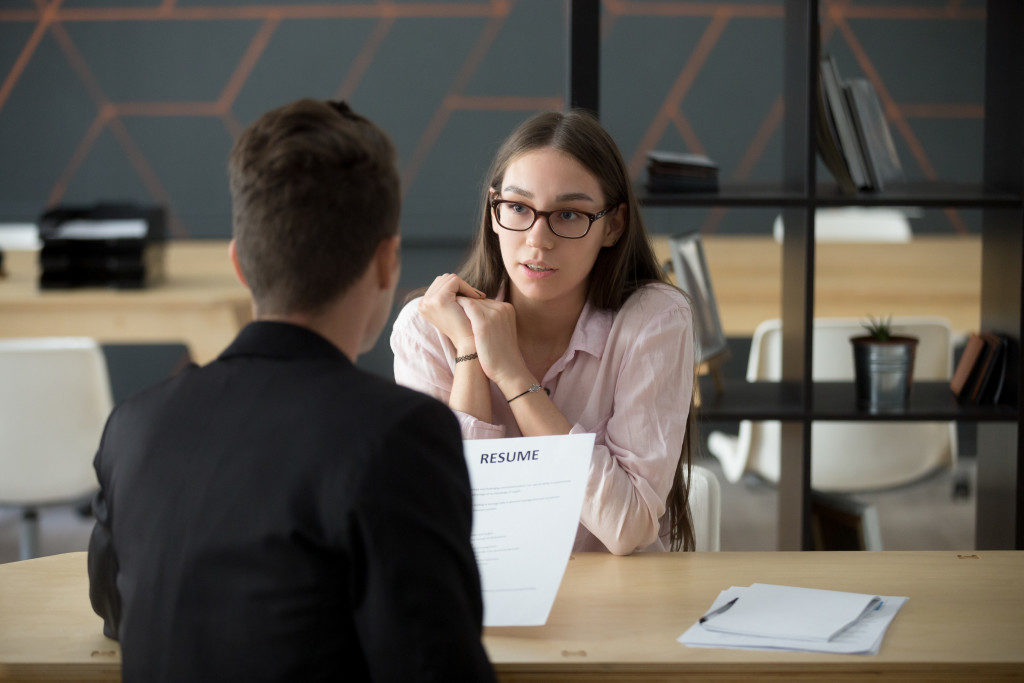hr personnel interviewing an applicant