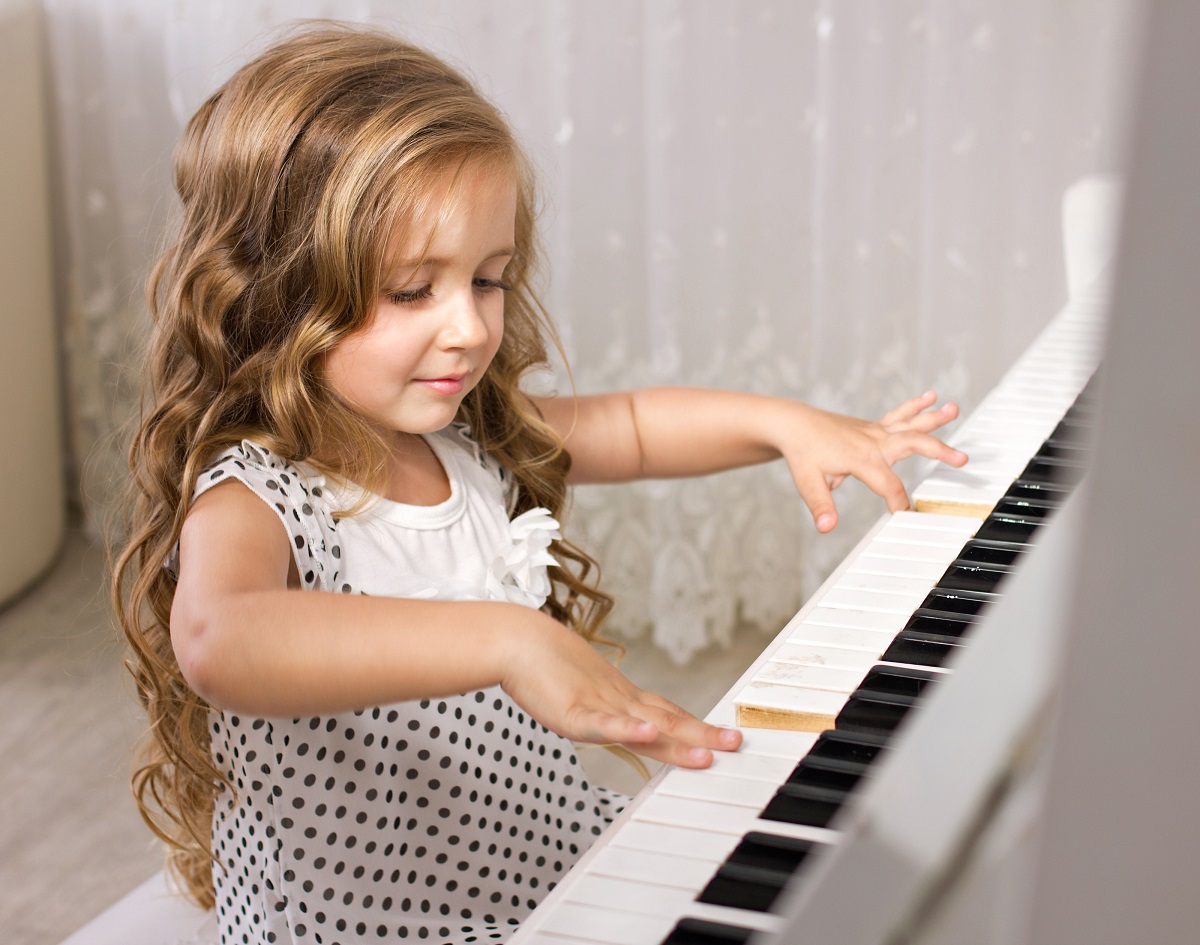 child playing piano