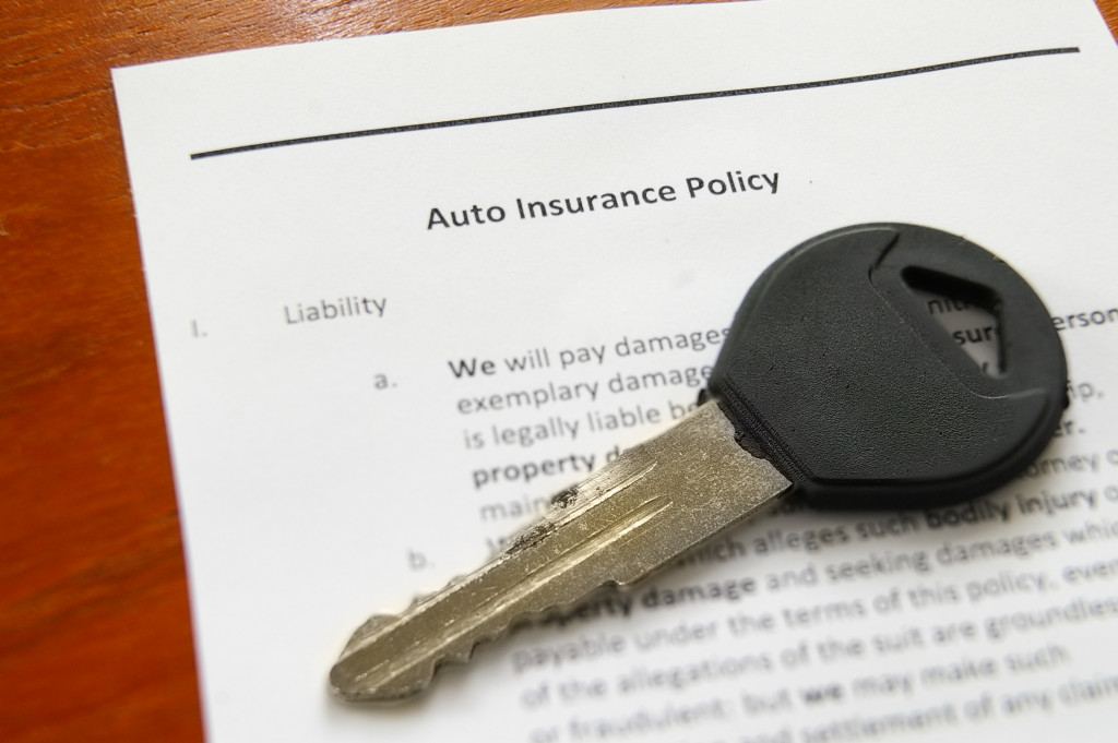 auto insurance policy with car key