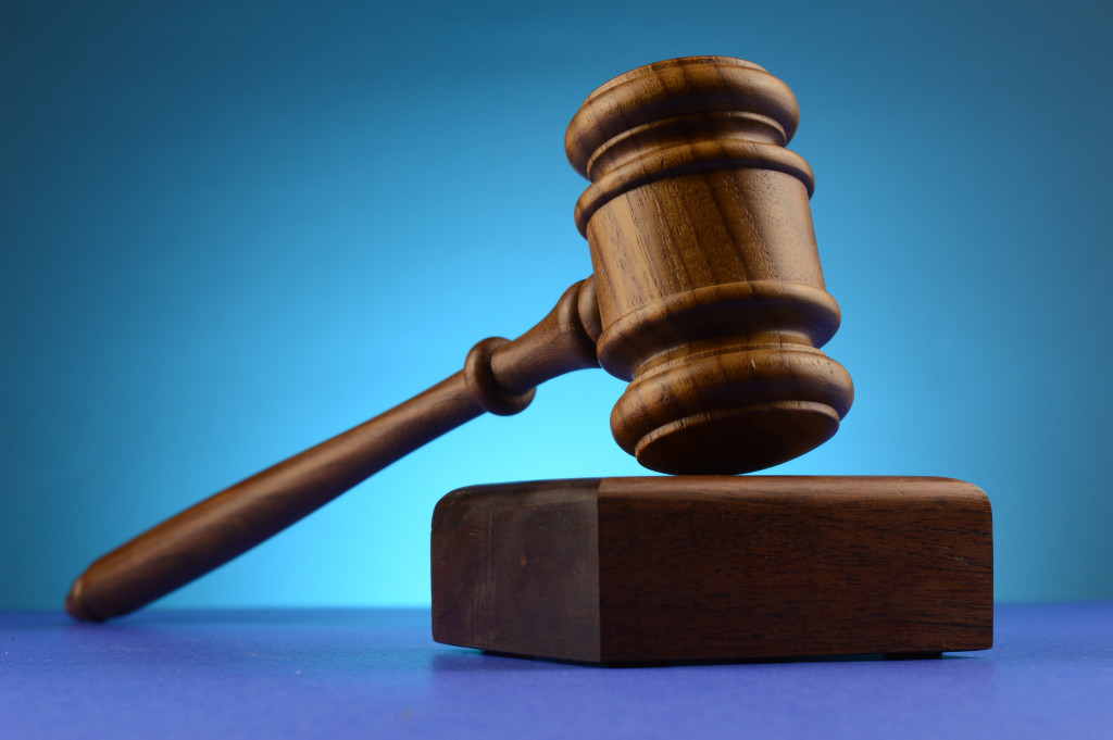 Wooden gavel on a blue background