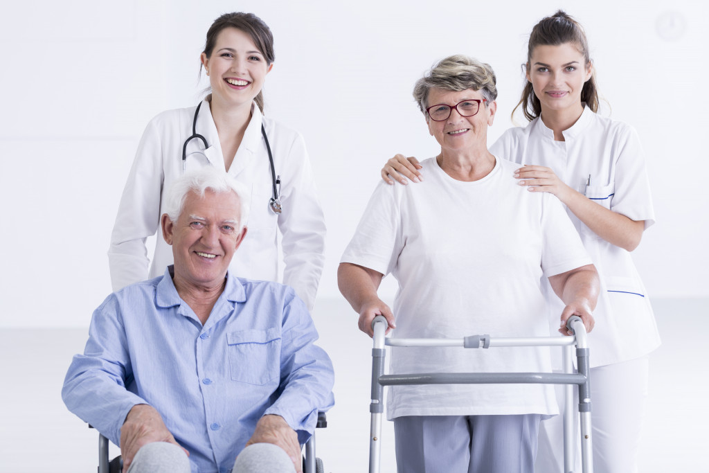 Doctor and nurse with elderly patients