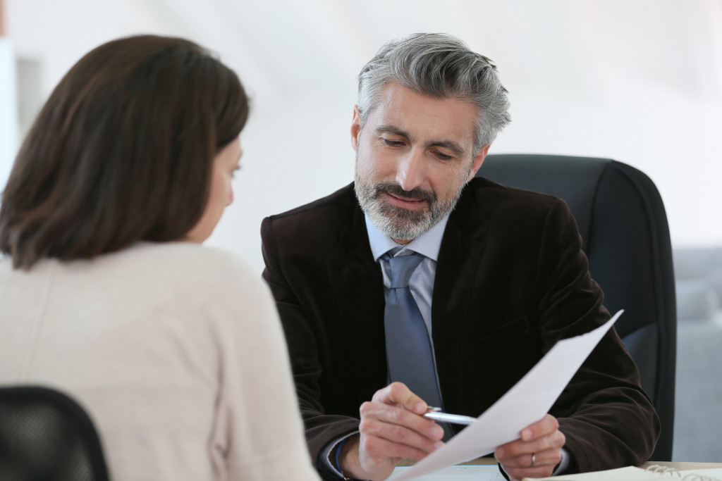 a woman consulting a lawyer